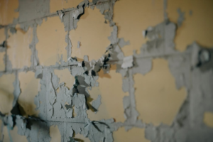 Peeling paint is a common after-effect of water damage